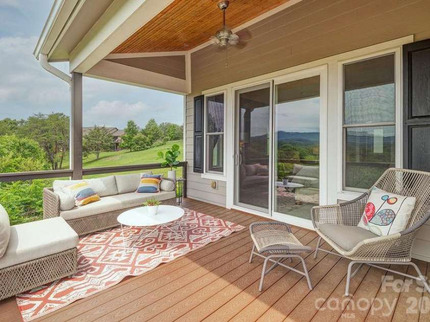 18 Adas Way, Weaverville, NC 28787.  MLS# CAR4385497, YatesRealty ID 31334. Private and quiet walk-out deck access to the main level primary suite 