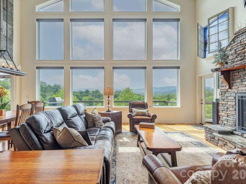 18 Adas Way, Weaverville, NC 28787.  MLS# CAR4385497, YatesRealty ID 31334. Sweeping mountain views greet you the moment you step inside — a daily reminder that you are living somewhere truly special