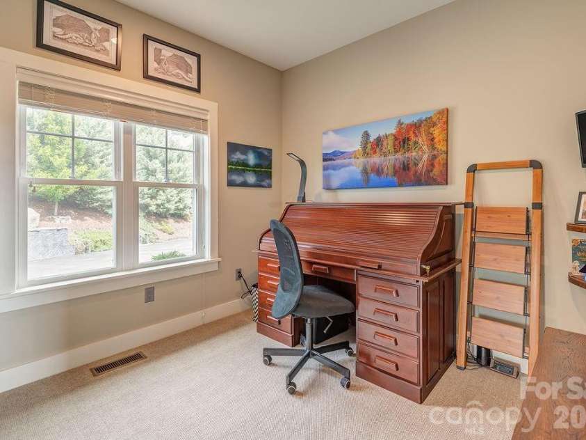 18 Adas Way, Weaverville, NC 28787.  MLS# CAR4385497, YatesRealty ID 31334. The perfect private workspace or additional guest space on the main level 