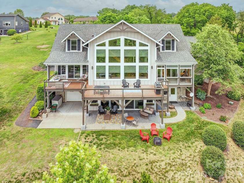 18 Adas Way, Weaverville, NC 28787.  MLS# CAR4385497, YatesRealty ID 31334. This custom-built luxury residence captures breathtaking Blue Ridge Mountain views from virtually every room