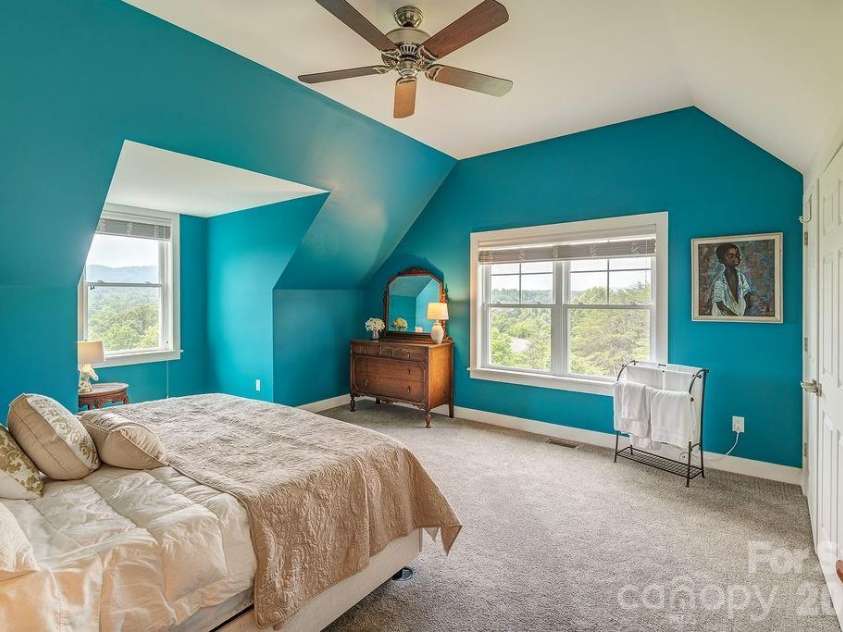 18 Adas Way, Weaverville, NC 28787.  MLS# CAR4385497, YatesRealty ID 31334. Two spacious guest rooms with soaring vaulted ceilings frame spectacular mountain views that will leave every visitor breathless