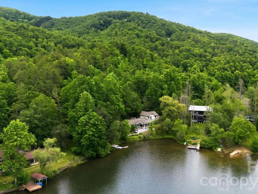 11 Echo Lake Drive, Fairview, NC 28730.  MLS# CAR4387481, YatesRealty ID 31338. Nestled In Nature