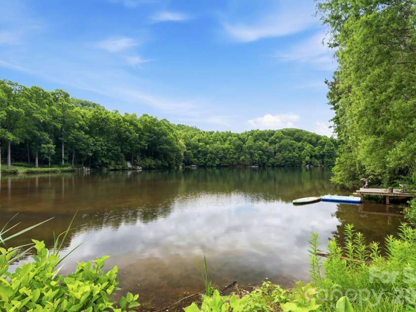 11 Echo Lake Drive, Fairview, NC 28730.  MLS# CAR4387481, YatesRealty ID 31338. Seamless Lake Access