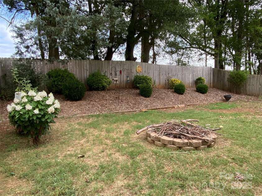 717 Sinclair Drive, Monroe, NC 28112.  MLS# CAR4290743, YatesRealty ID 31343. Rear yard