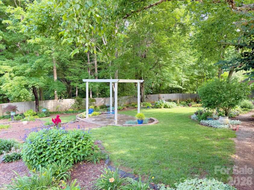 7029 Forest Hills Drive, Denver, NC 28037.  MLS# CAR4386920, YatesRealty ID 31346. Backyard 1