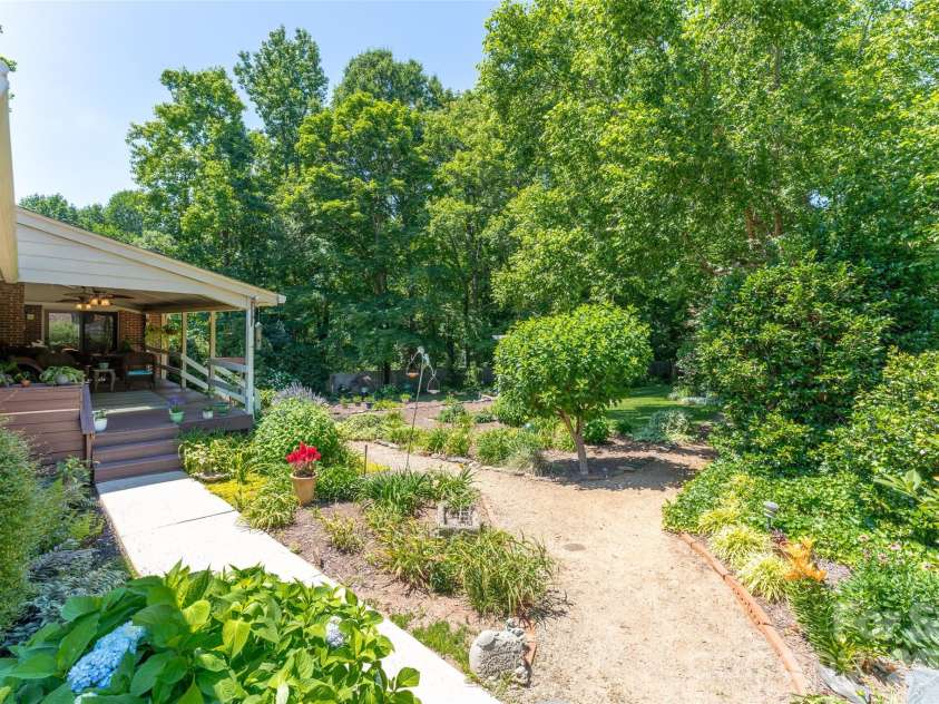 7029 Forest Hills Drive, Denver, NC 28037.  MLS# CAR4386920, YatesRealty ID 31346. Backyard from side