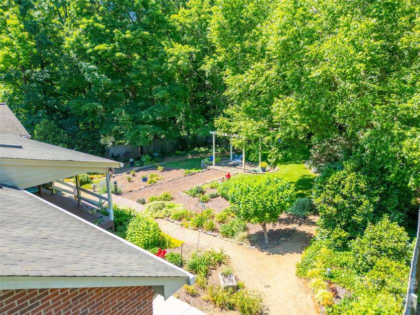 7029 Forest Hills Drive, Denver, NC 28037.  MLS# CAR4386920, YatesRealty ID 31346. Backyard from side and above