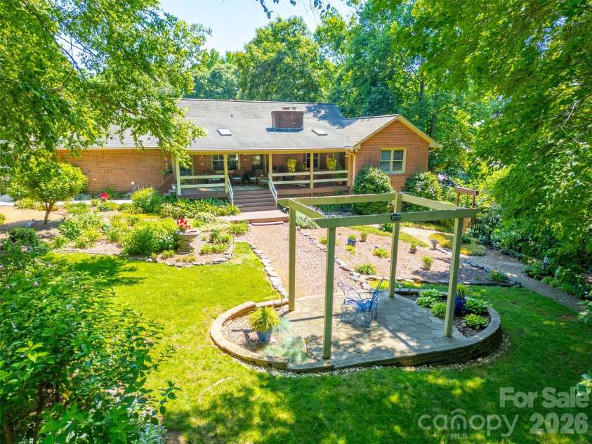 7029 Forest Hills Drive, Denver, NC 28037.  MLS# CAR4386920, YatesRealty ID 31346. Backyard towards house