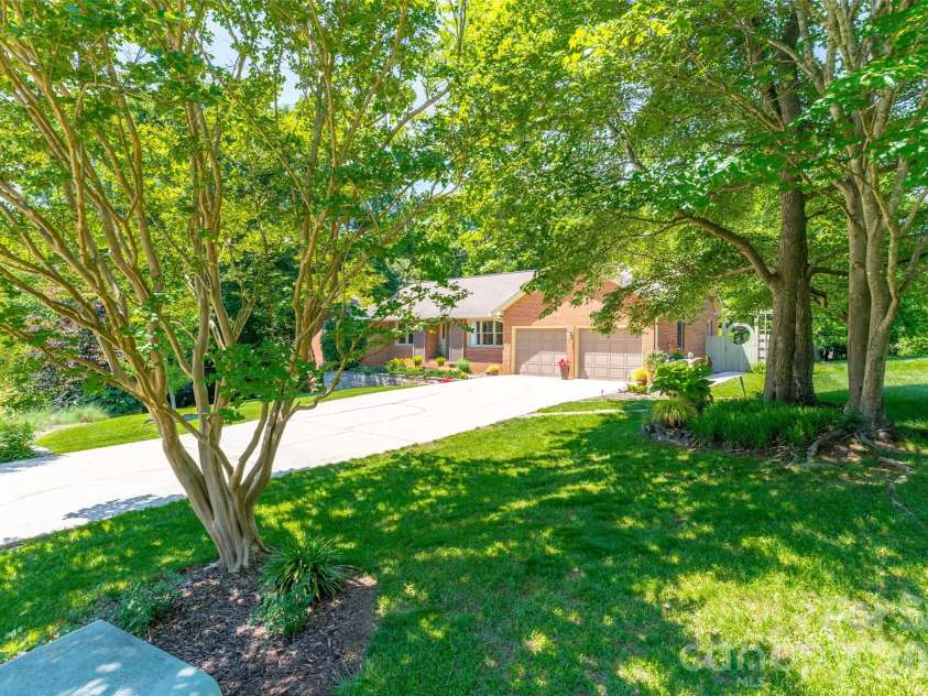 7029 Forest Hills Drive, Denver, NC 28037.  MLS# CAR4386920, YatesRealty ID 31346. Front of home from corner