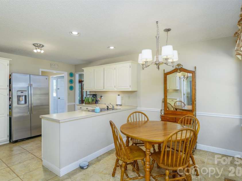 7029 Forest Hills Drive, Denver, NC 28037.  MLS# CAR4386920, YatesRealty ID 31346. Kitchen and Breakfast Area