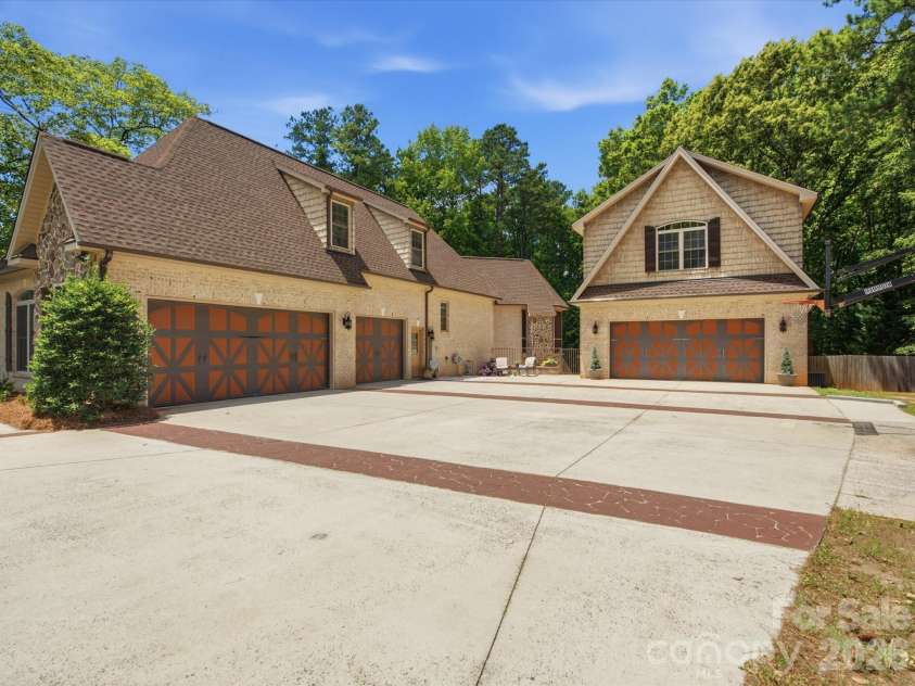 2894 Lakeshore Drive, Chester, SC 29706.  MLS# CAR4393465, YatesRealty ID 31347. Front with garages