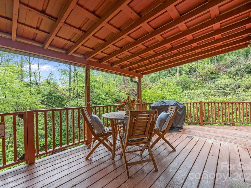 5838 Bearwallow Mountain Road, Gerton, NC 28735.  MLS# CAR4289174, YatesRealty ID 31348. Covered deck -