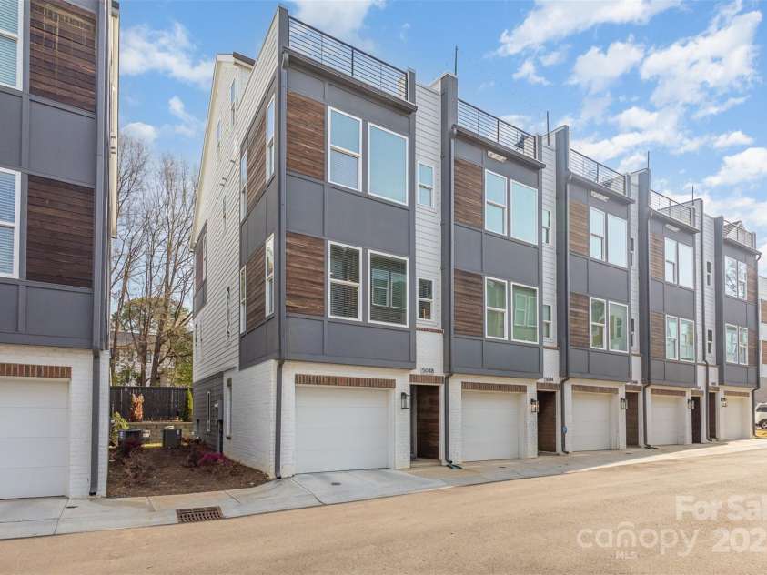 5048 York Park Lane, Charlotte, NC 28217.  MLS# CAR4216095, YatesRealty ID 3135. End-unit townhome with attached tandem garage