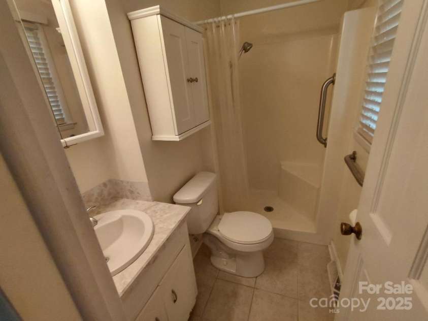 3844 Dover Street, Claremont, NC 28610.  MLS# CAR4290927, YatesRealty ID 31350. Master bathroom