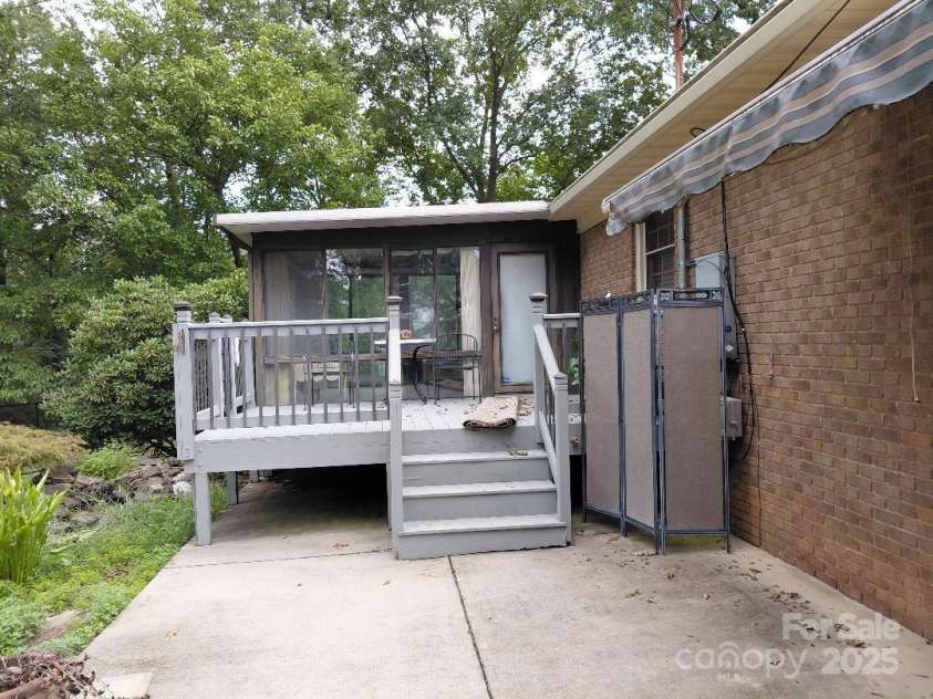3844 Dover Street, Claremont, NC 28610.  MLS# CAR4290927, YatesRealty ID 31350. Rear deck off of sunroom