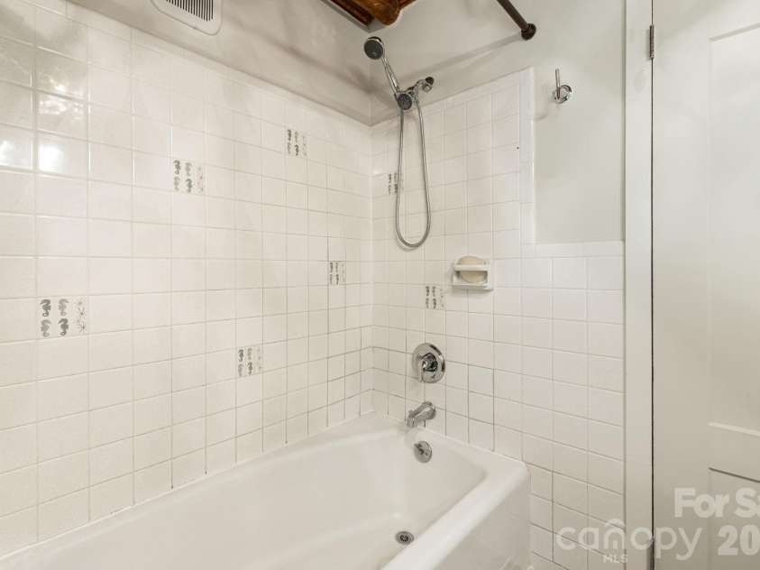 128 Tee Off Lane, Hendersonville, NC 28792.  MLS# CAR4390885, YatesRealty ID 31352. 