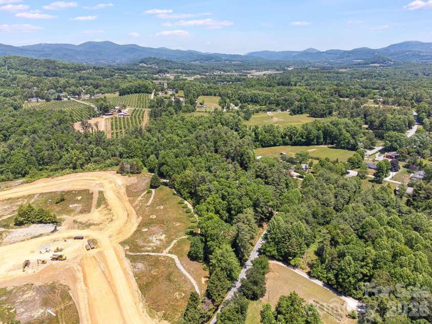 128 Tee Off Lane, Hendersonville, NC 28792.  MLS# CAR4390885, YatesRealty ID 31352. 