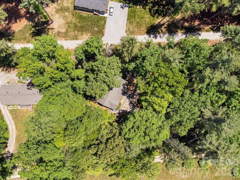 128 Tee Off Lane, Hendersonville, NC 28792.  MLS# CAR4390885, YatesRealty ID 31352. 