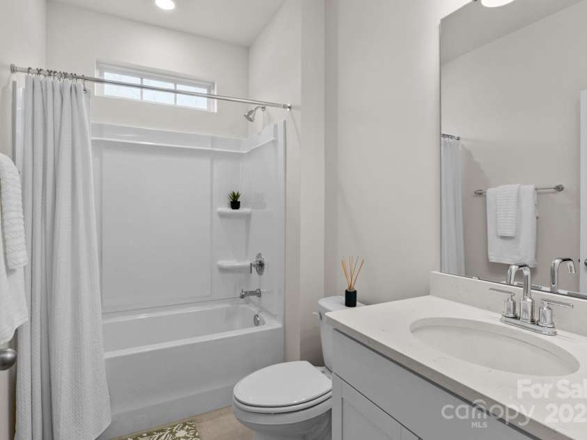 117 Ari Avenue, Troutman, NC 28166.  MLS# CAR4284417, YatesRealty ID 31357. Guest bath main