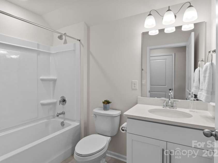 117 Ari Avenue, Troutman, NC 28166.  MLS# CAR4284417, YatesRealty ID 31357. Upstairs full bath