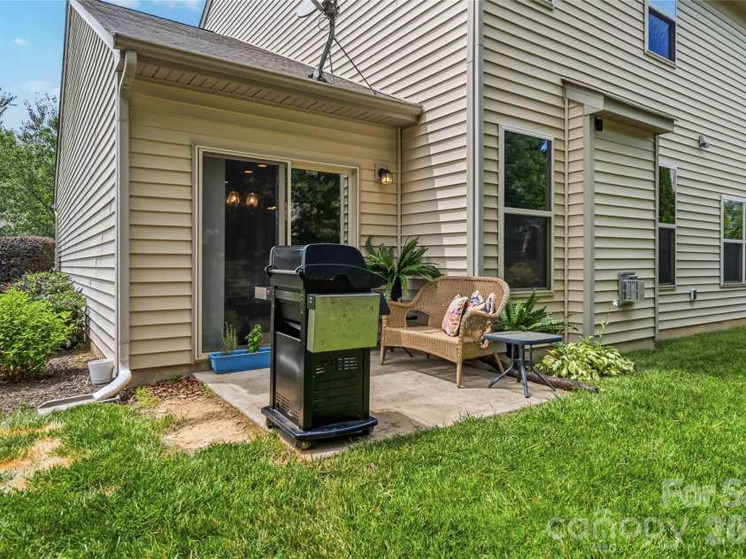 4007 Cloud View Lane, Indian Trail, NC 28079.  MLS# CAR4394294, YatesRealty ID 31366. Back patio for quick access to grill cooking and gardening