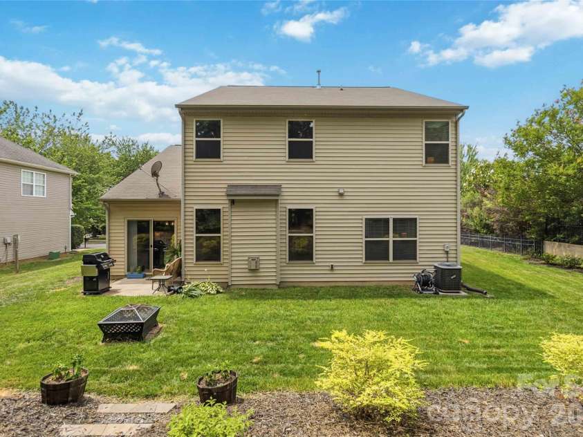 4007 Cloud View Lane, Indian Trail, NC 28079.  MLS# CAR4394294, YatesRealty ID 31366. Backyard has been tiered to provide ample flat space and natural areas for low maintenance landscaping