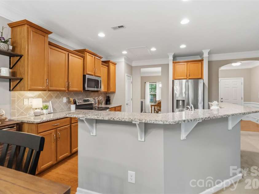 4007 Cloud View Lane, Indian Trail, NC 28079.  MLS# CAR4394294, YatesRealty ID 31366. Bar height counter perfect for quick meals and entertaining