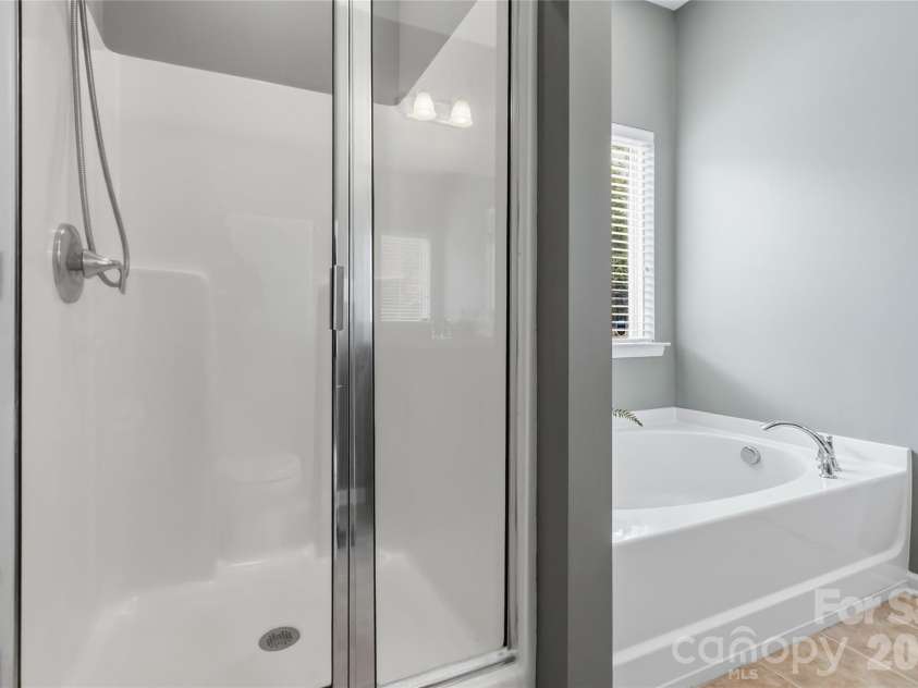 4007 Cloud View Lane, Indian Trail, NC 28079.  MLS# CAR4394294, YatesRealty ID 31366. Separate tub and shower stall