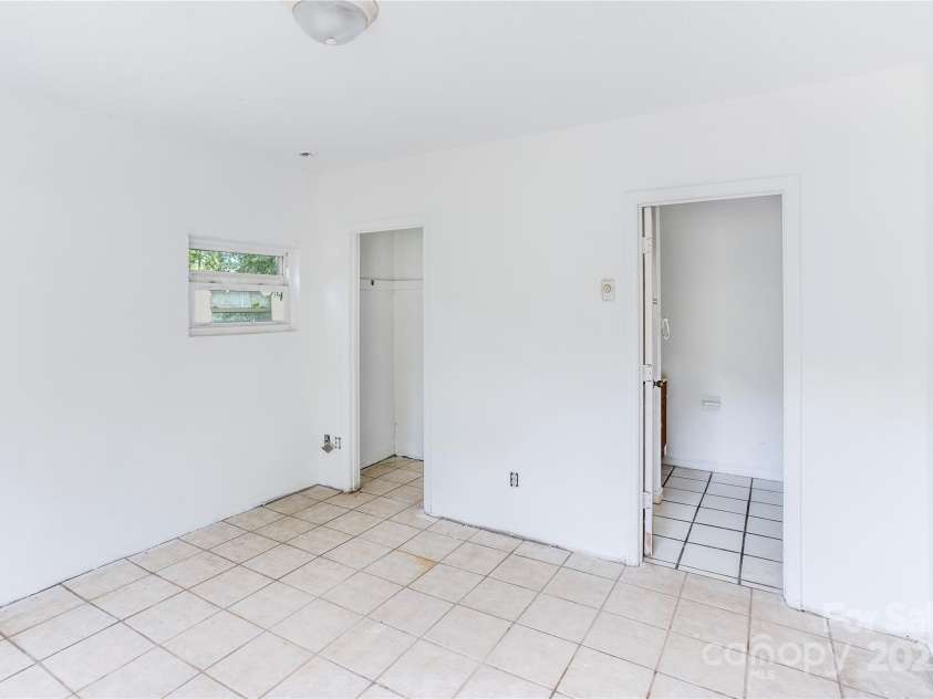 76 Trent Road, Brevard, NC 28712.  MLS# CAR4275509, YatesRealty ID 31366. Downstairs room