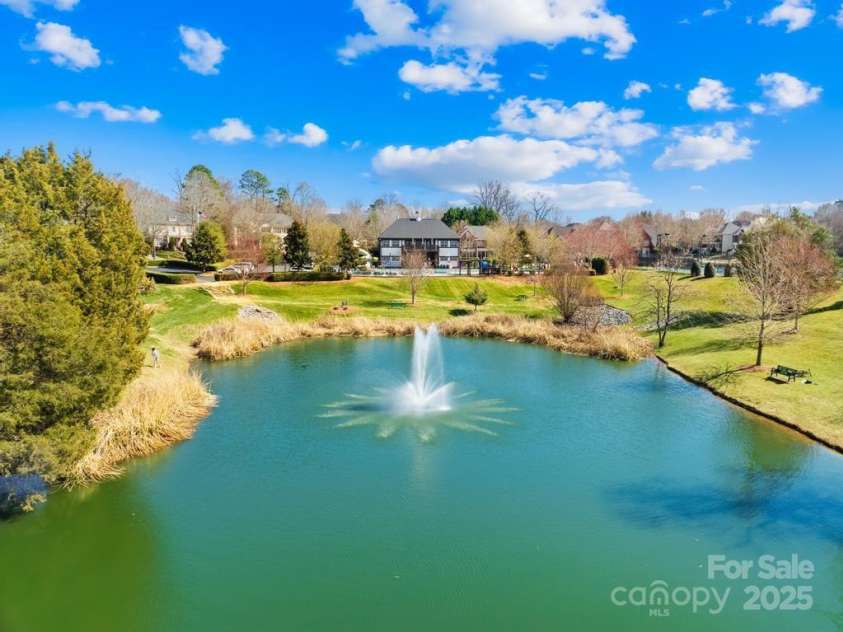 9433 Gilpatrick Lane, Huntersville, NC 28078.  MLS# CAR4231980, YatesRealty ID 3137. Community pond and amenities in the back ground