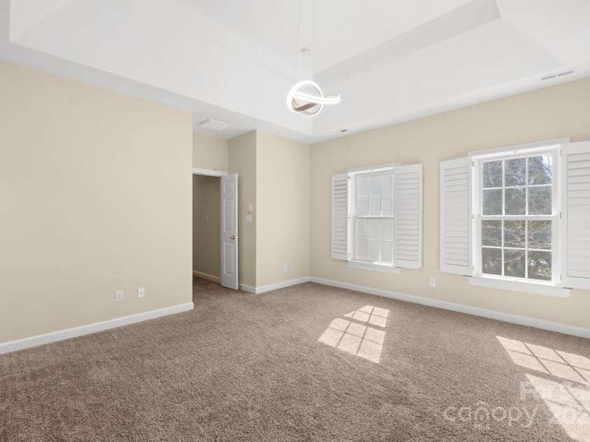 9433 Gilpatrick Lane, Huntersville, NC 28078.  MLS# CAR4231980, YatesRealty ID 3137. Primary Suite with plantation shutters