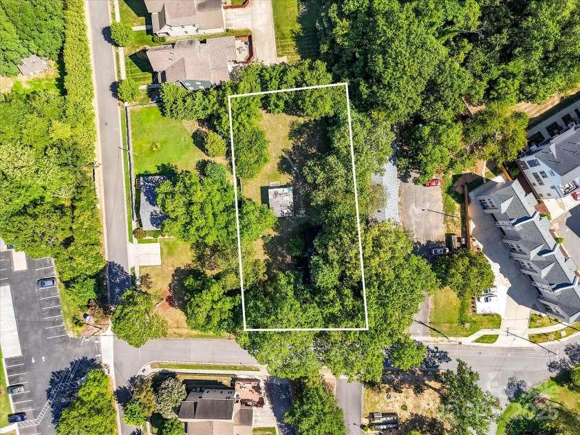 1119 Lomax Avenue, Charlotte, NC 28211.  MLS# CAR4286732, YatesRealty ID 31370. Aerial photo of home located on nearly 1/2 acre, level lot with tons of trees for privacy in a highly desirable location in Charlotte!