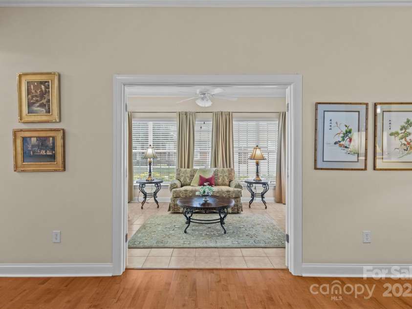 3270 Abbey Walk Lane, Matthews, NC 28105.  MLS# CAR4288401, YatesRealty ID 31371. Cozy sunroom with french doors