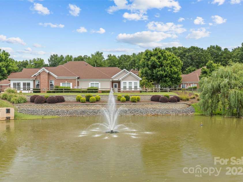 3270 Abbey Walk Lane, Matthews, NC 28105.  MLS# CAR4288401, YatesRealty ID 31371. Neighborhood pond