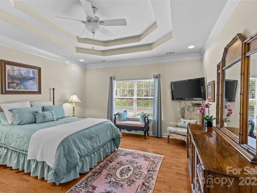 3270 Abbey Walk Lane, Matthews, NC 28105.  MLS# CAR4288401, YatesRealty ID 31371. Primary bedroom