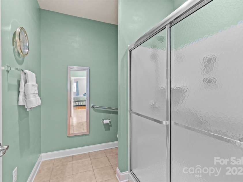 3270 Abbey Walk Lane, Matthews, NC 28105.  MLS# CAR4288401, YatesRealty ID 31371. Walk in shower
