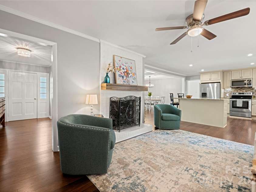 725 Plantation Road, Lancaster, SC 29720.  MLS# CAR4278897, YatesRealty ID 31372. Family room with fireplace