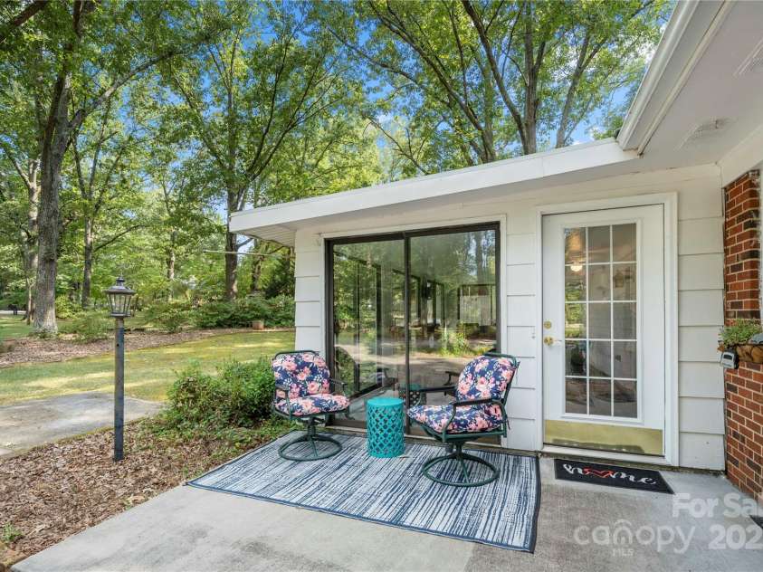 725 Plantation Road, Lancaster, SC 29720.  MLS# CAR4278897, YatesRealty ID 31372. Patio off of the sunroom