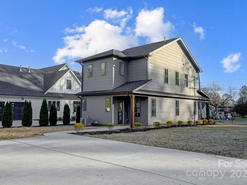 901 Edgemont Avenue, Belmont, NC 28012.  MLS# CAR4204601, YatesRealty ID 31374. Back view from the parking pad