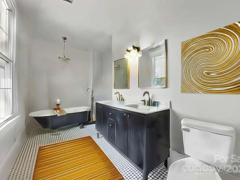 522 Alexander Street, Statesville, NC 28677.  MLS# CAR4279666, YatesRealty ID 31375. Primary Bath w/ shower & claw foot tub