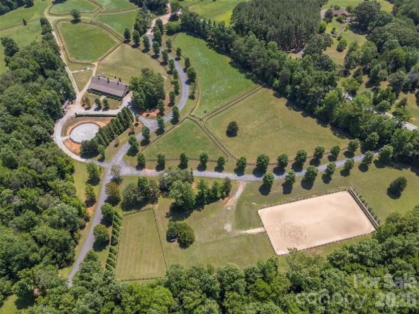 398 Mapleton Lane, Columbus, NC 28722.  MLS# CAR4393897, YatesRealty ID 31376. Equestrian facility with community barn and riding arena