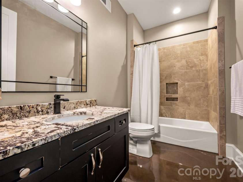 398 Mapleton Lane, Columbus, NC 28722.  MLS# CAR4393897, YatesRealty ID 31376. Full bathroom in lower level 