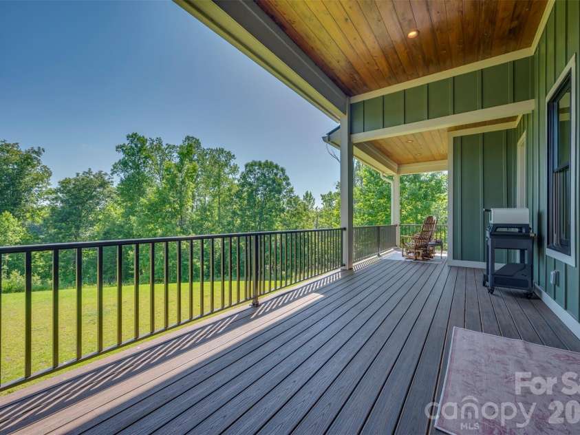 398 Mapleton Lane, Columbus, NC 28722.  MLS# CAR4393897, YatesRealty ID 31376. Large covered porch, perfect for grill parties 