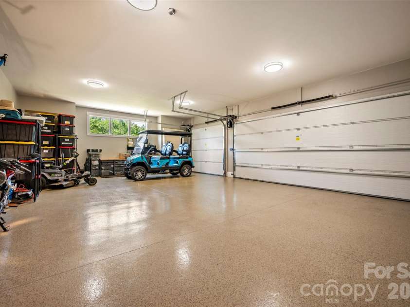 398 Mapleton Lane, Columbus, NC 28722.  MLS# CAR4393897, YatesRealty ID 31376. Large three car garage with electric car charging plug 
