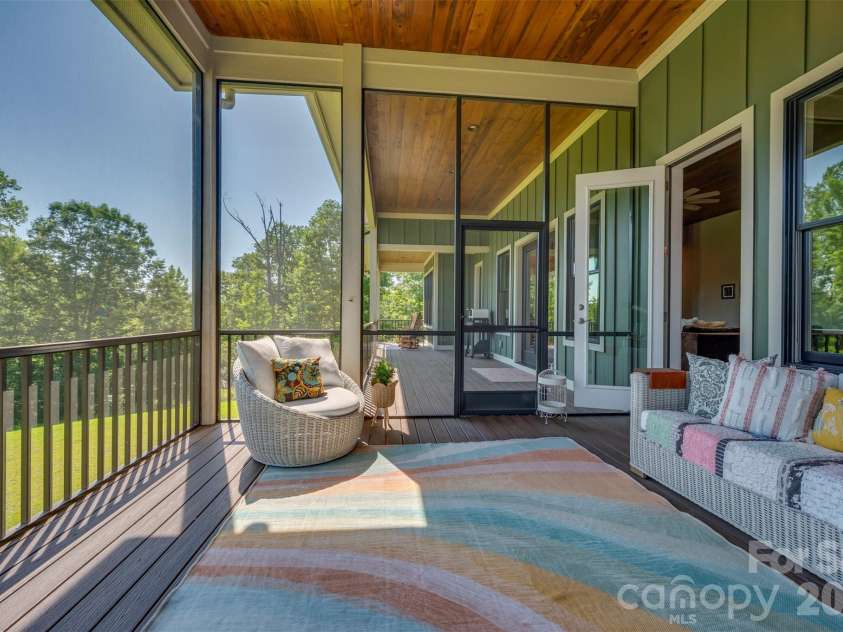 398 Mapleton Lane, Columbus, NC 28722.  MLS# CAR4393897, YatesRealty ID 31376. Screened-in covered porch