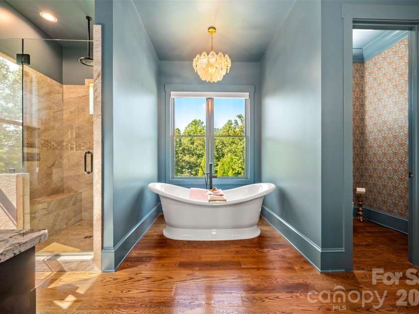 398 Mapleton Lane, Columbus, NC 28722.  MLS# CAR4393897, YatesRealty ID 31376. Soaking tub, shower and two vanities