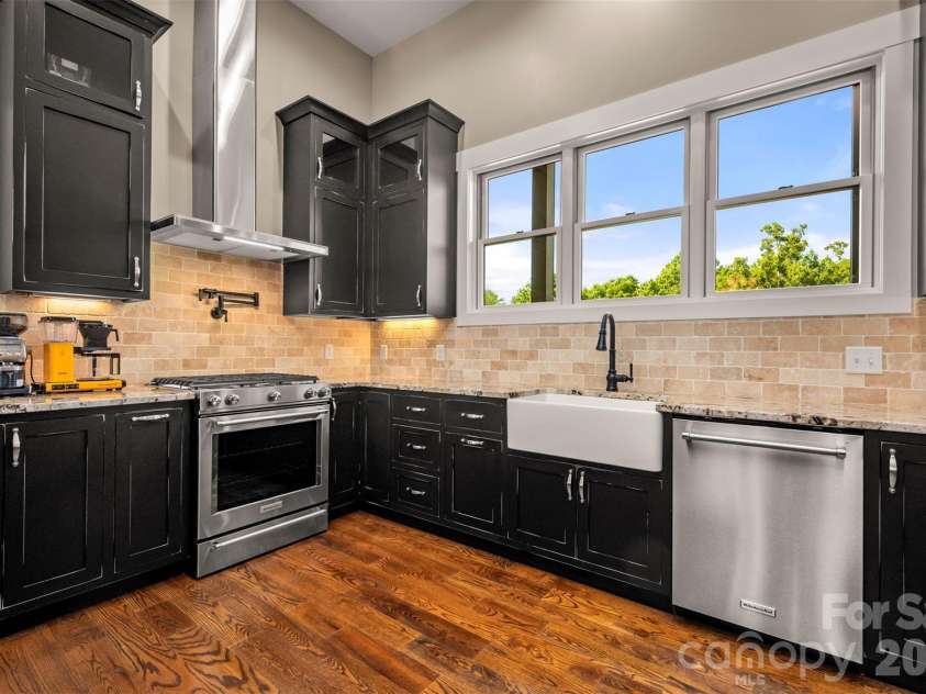 398 Mapleton Lane, Columbus, NC 28722.  MLS# CAR4393897, YatesRealty ID 31376. Upscale appliances in this custom kitchen
