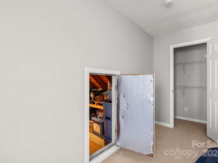 8802 Glenside Street, Huntersville, NC 28078.  MLS# CAR4225833, YatesRealty ID 31376. Door in Bedroom 4 leads to attic storage.