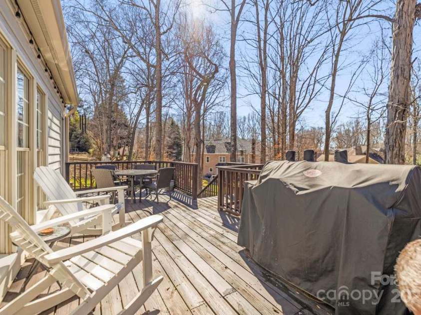 8802 Glenside Street, Huntersville, NC 28078.  MLS# CAR4225833, YatesRealty ID 31376. Spacious deck off screened porch.
