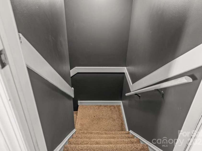 8802 Glenside Street, Huntersville, NC 28078.  MLS# CAR4225833, YatesRealty ID 31376. Stairs to finished basement.